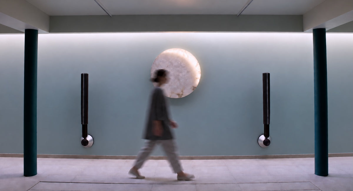 MOON Ninety Alabaster on a concrete wall in a gallery space