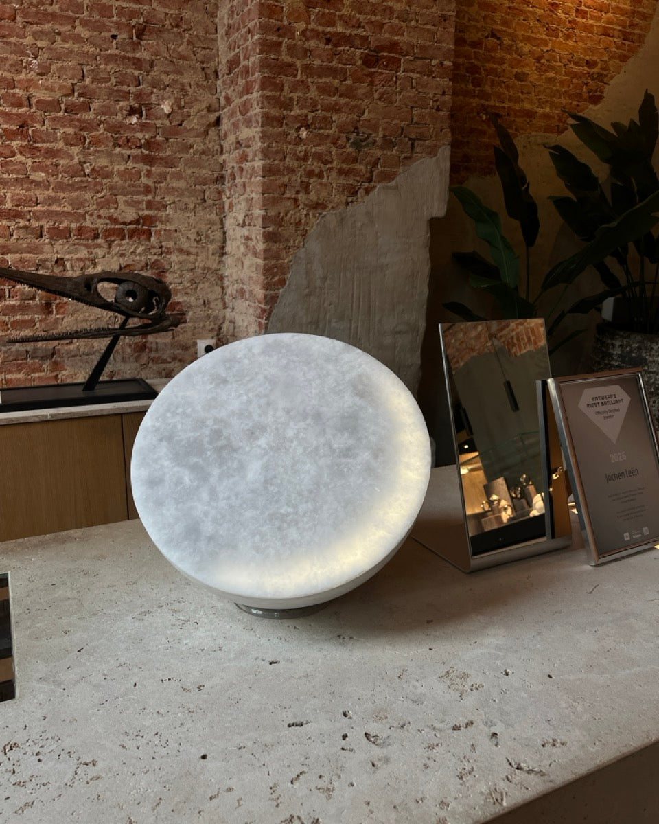 MOON Forty on a stone counter against a brick wall at a retailer in Antwerp